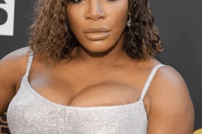 Serena Williams serving at Wimbledon, showcasing the athletic dominance that earned her $94M+ in prize money"
